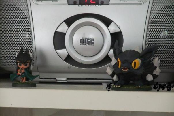 Isn’t this amazing? Django Wexler painted and sent these to me – so fabulous! I have them sitting on the bookshelf next to my writing desk, next to one of my most important pieces of writing equipment – my little cd player.